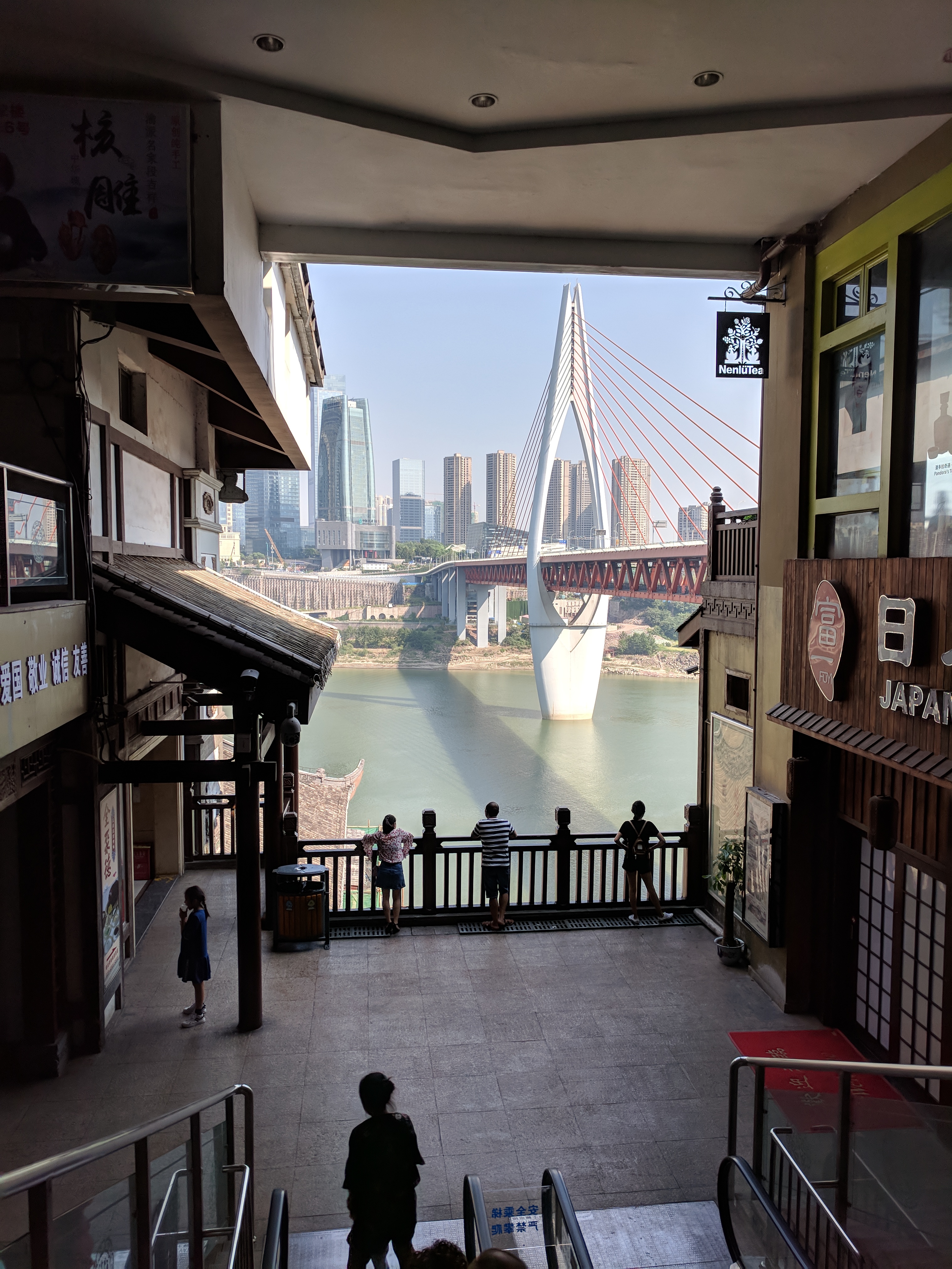 Photo of a bridge taken from inside a building