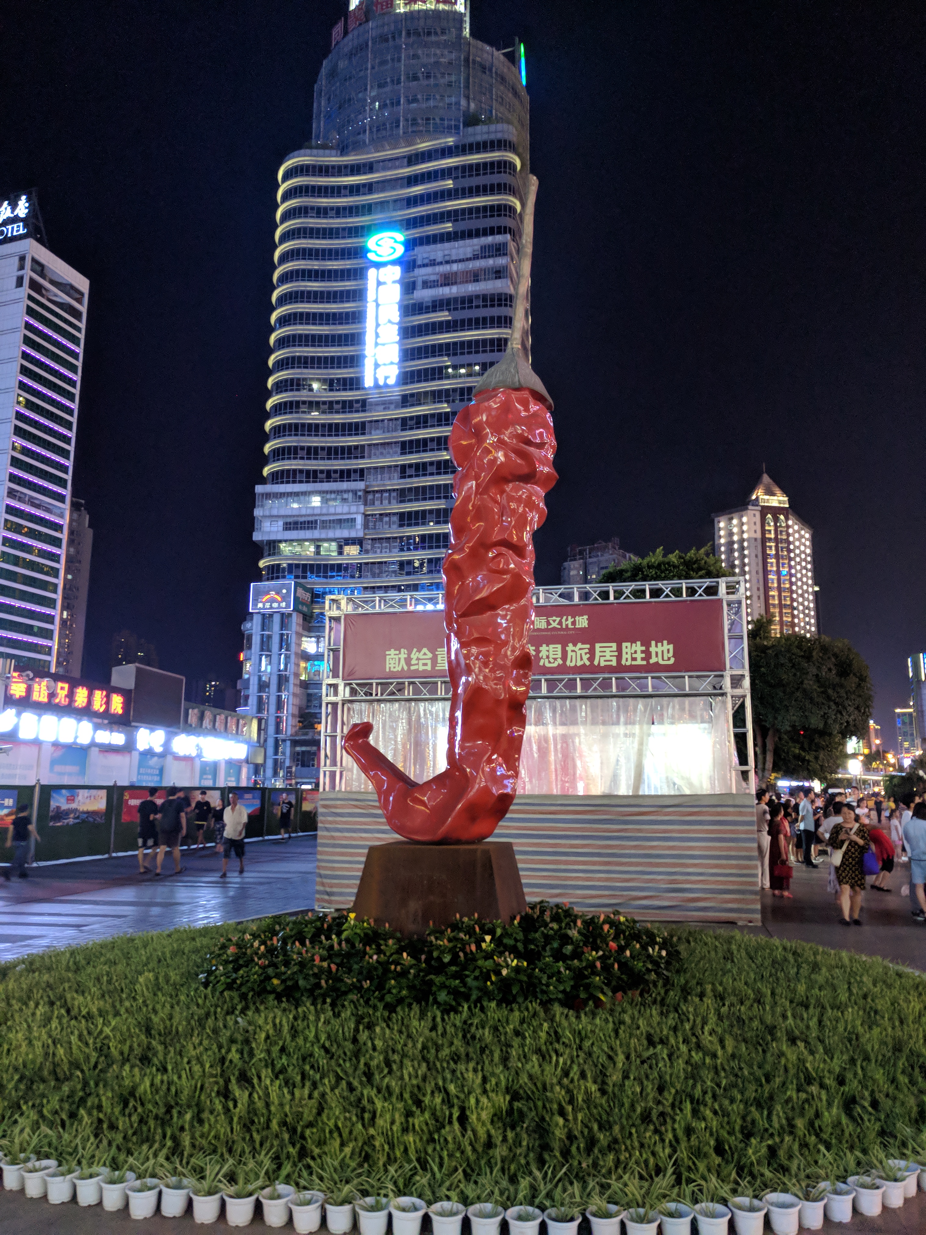 A statue of a red chilli pepper